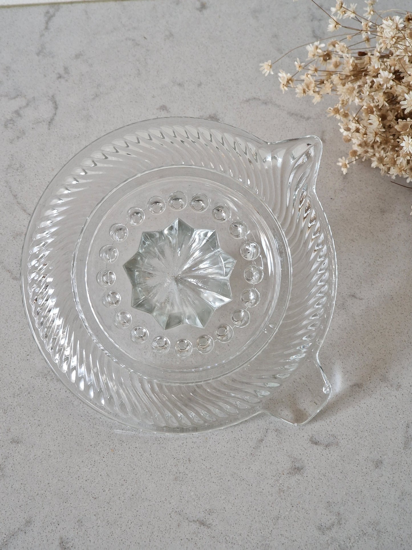 Lasinen sitruspuristin