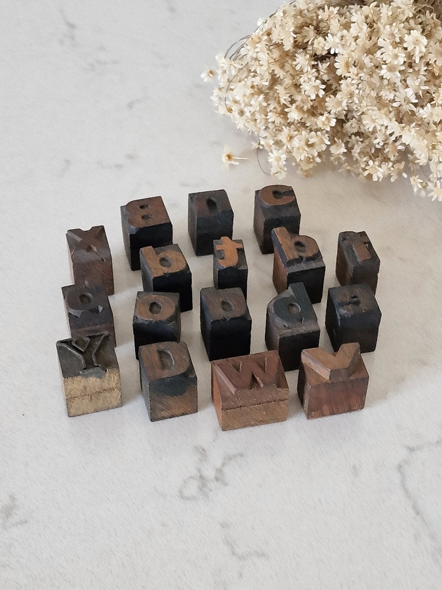 vanhat kirjapainokastin kirjasimet