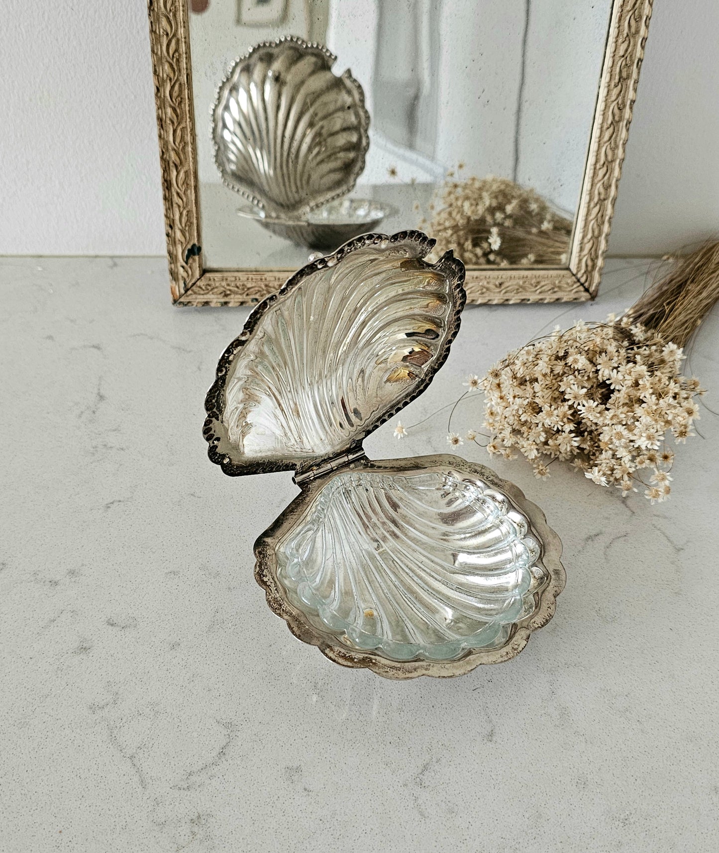 Metallinen simpukkarasia