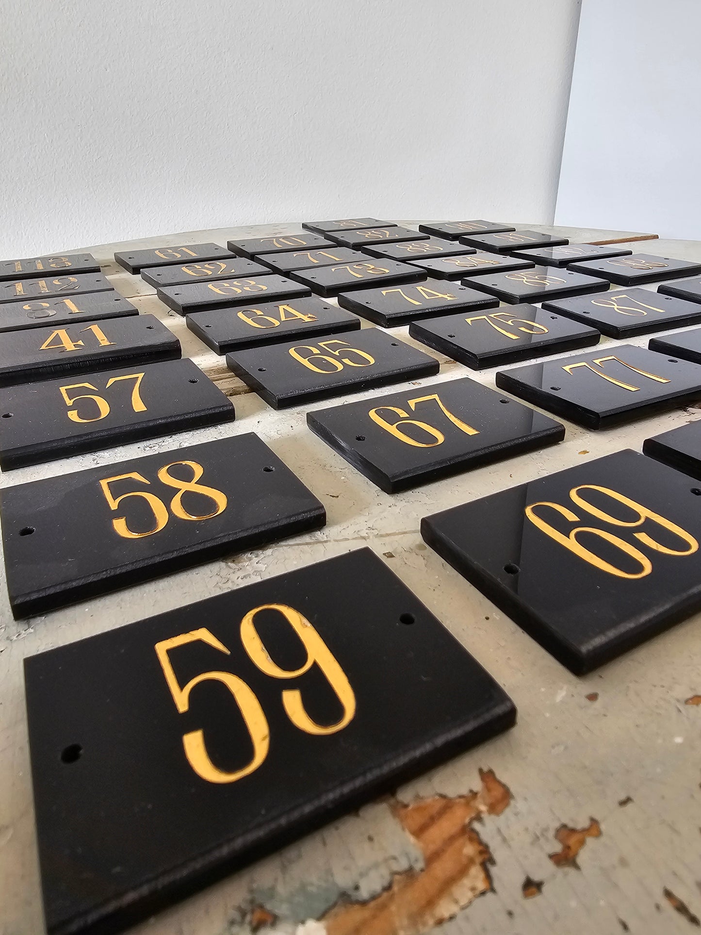 Black and gold number plates