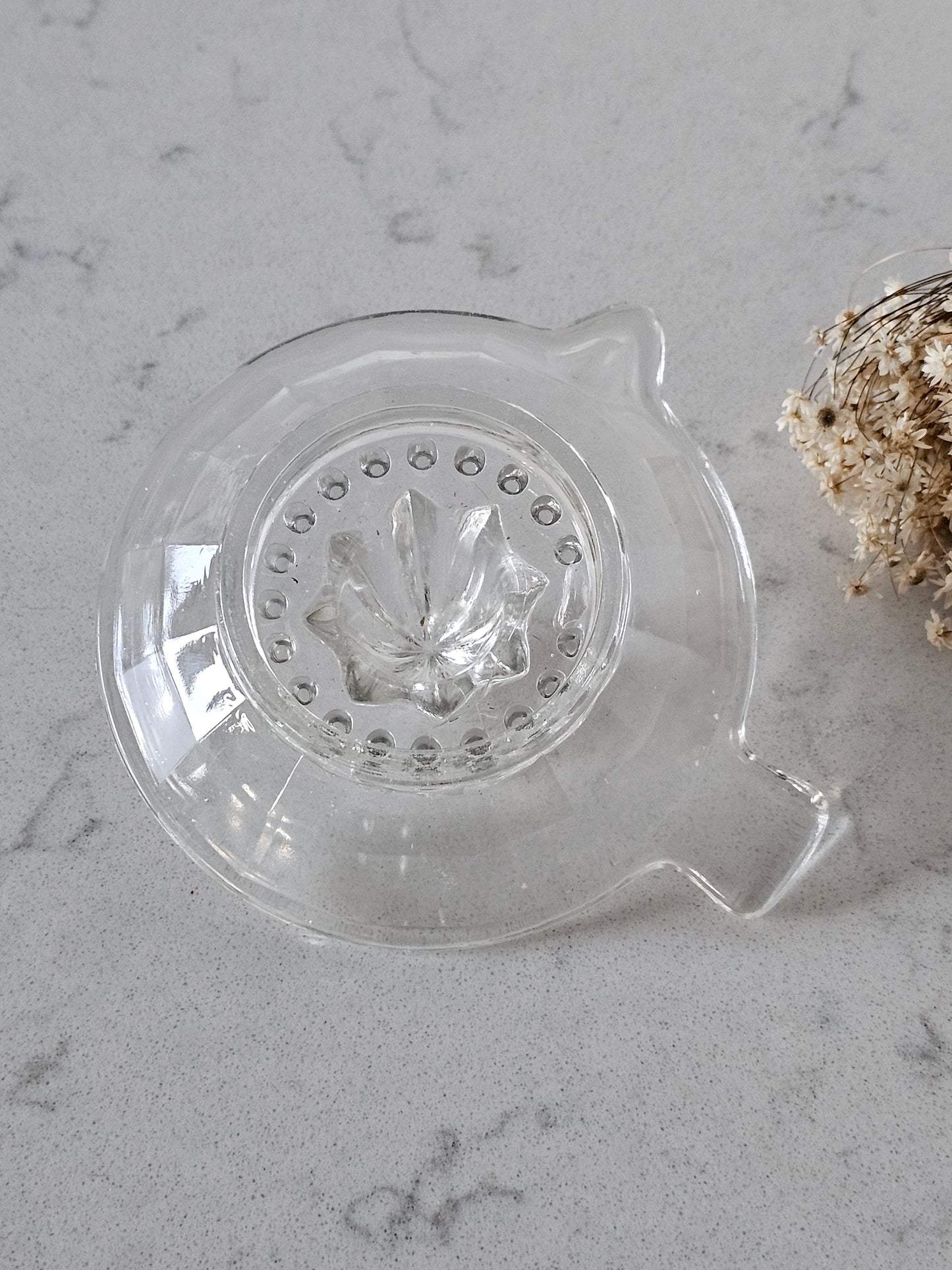 Lasinen sitruspuristin