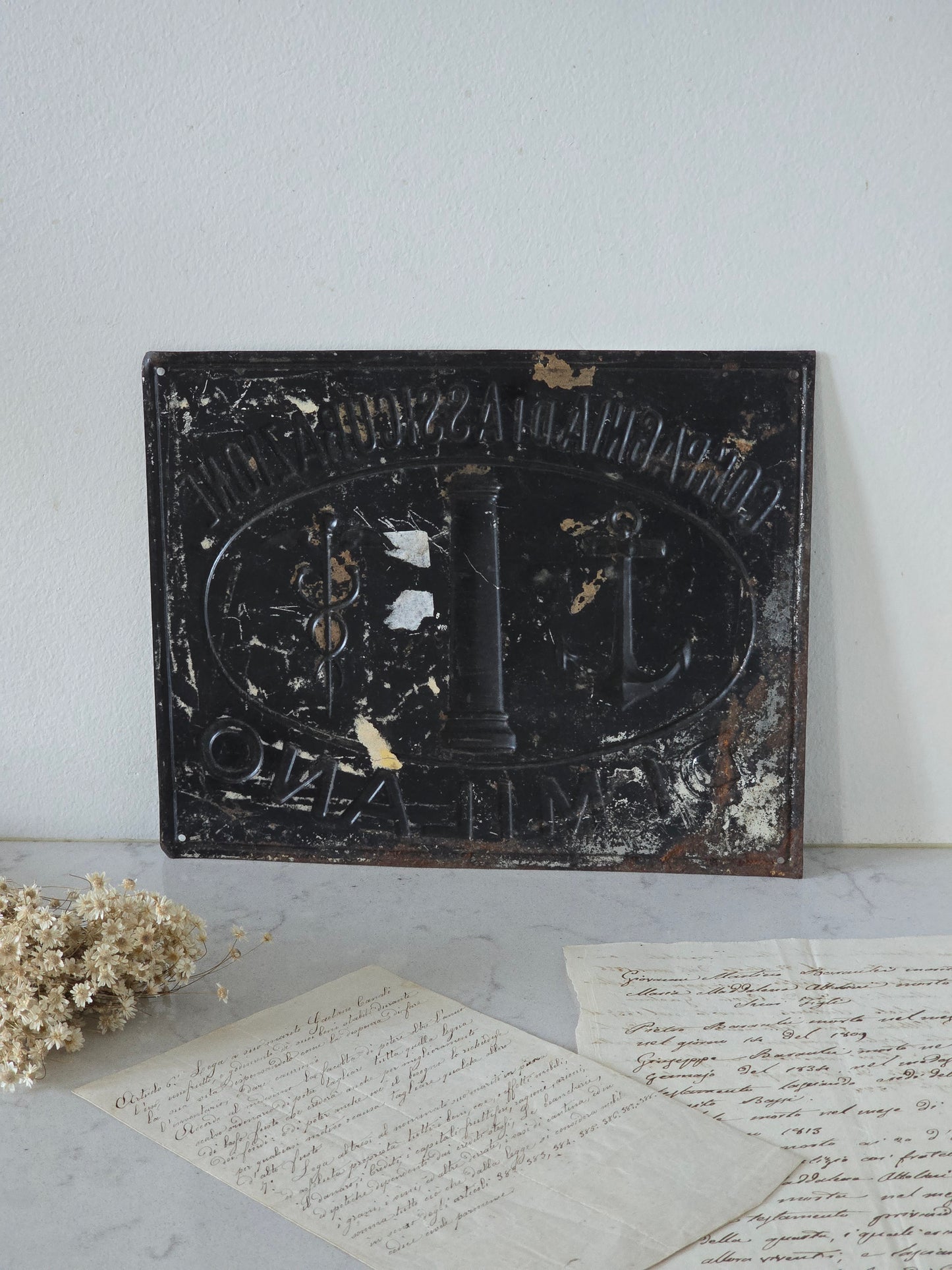 Italialainen vanha vakuutusyhtiön kyltti