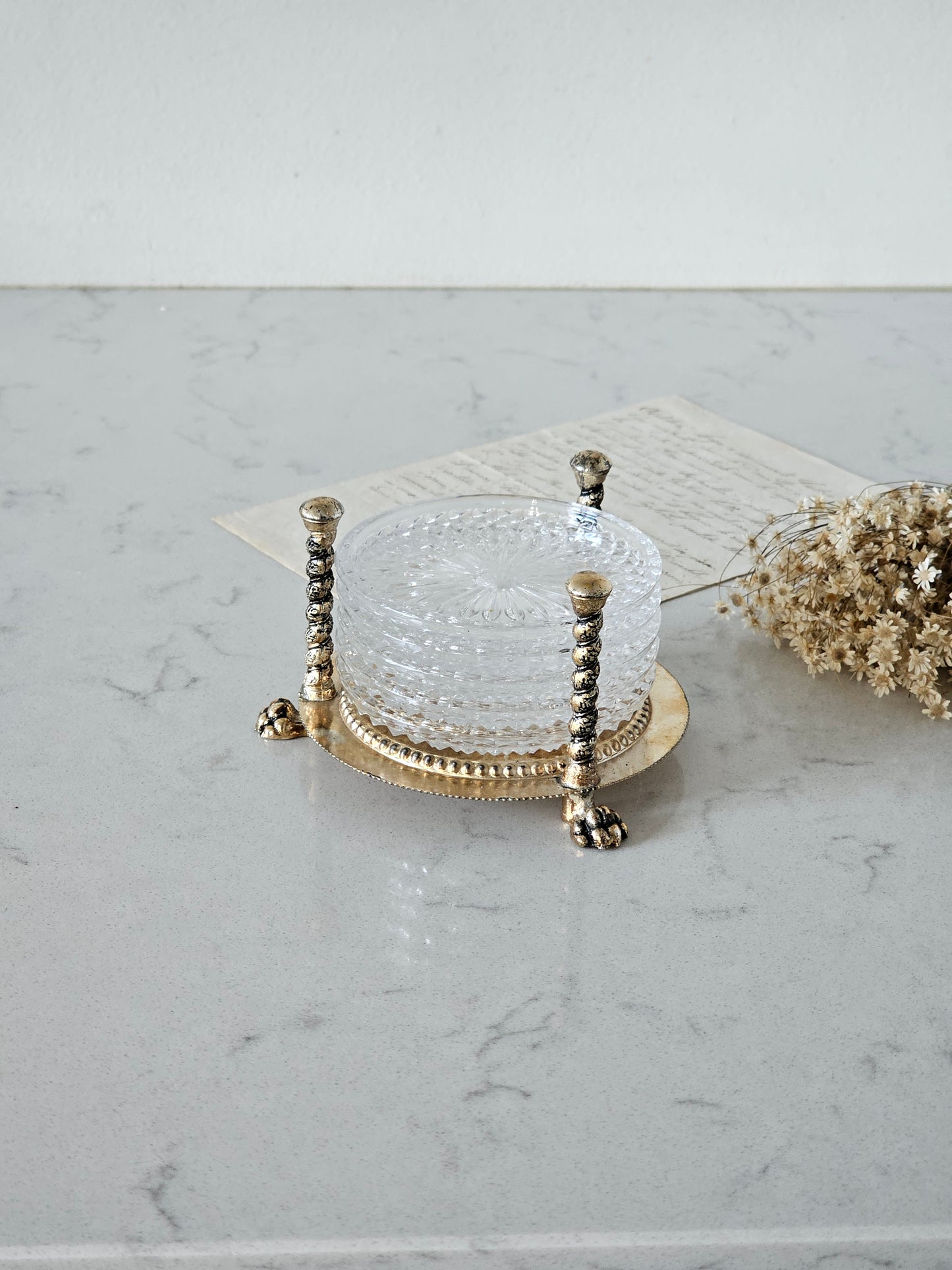 Kristalliset vintage lasinaluset metallitelineellä