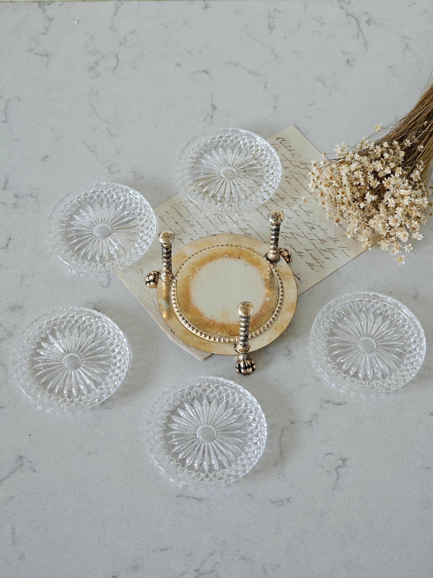 Kristalliset vintage lasinaluset metallitelineellä