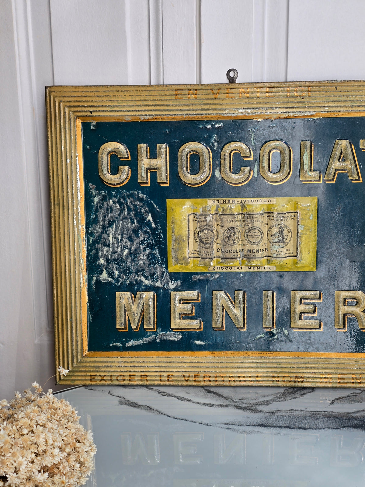 Vanha Chocolat Menier vintage-kyltti.