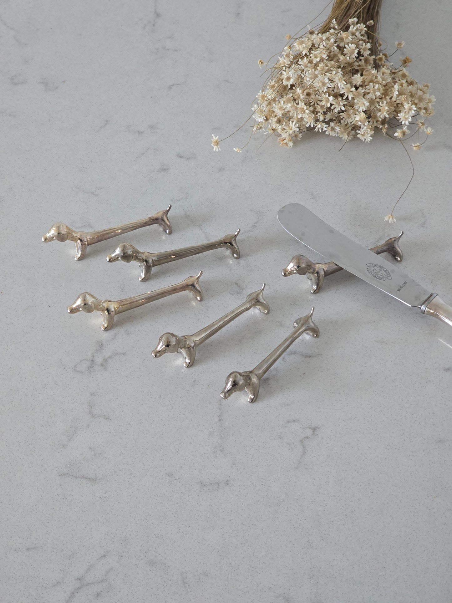 Mäyräkoira-aterinlepuuttaja