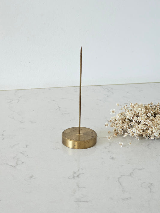 A brass spike